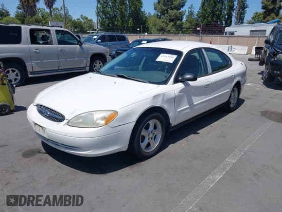 ✅ 2001 Ford Taurus LX • VIN: 1FAFP52U01G153060 • Лот: 42543418. Опубликован ранее на IAAI с пробегом 175 738 миль. Бесплатный доступ к архиву аукционных продаж из США и подробный отчёт об истории автомобиля на DreamBid. Изображение 2.