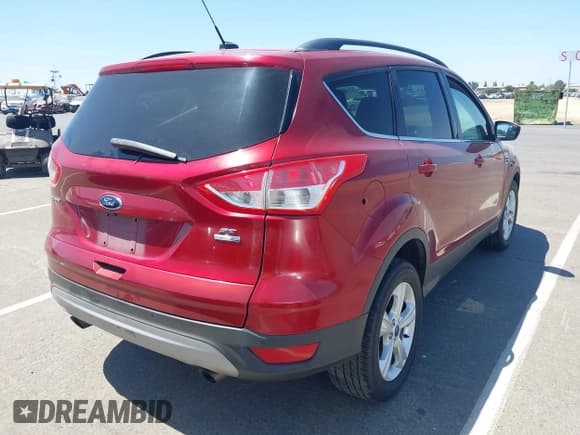 ✅ 2014 Ford Escape SE • VIN: 1FMCU9GX3EUB64623 • Lot: 42560923. Listed on IAAI with 120,730 mi. Free auction sales archive from the USA and detailed vehicle history report at DreamBid. Image 4.