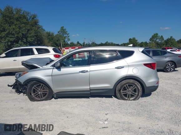 ✅ 2017 Hyundai Santa Fe 2.4L • VIN: 5XYZU3LB4HG399480 • Lot: 43458871. Listed on IAAI with 118,792 mi. Free auction sales archive from the USA and detailed vehicle history report at DreamBid. Image 15.