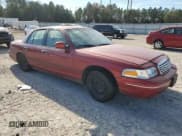 ✅ 2001 Ford Crown Victoria • VIN: 2FAFP73W51X102000 • Lot: 83523364. Listed on Copart with 202,320 mi. Free auction sales archive from the USA and detailed vehicle history report at DreamBid. Image 4.