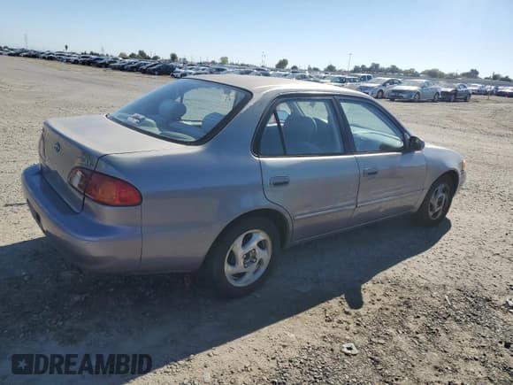 ✅ 1998 Toyota Corolla LE • VIN: 1NXBR18E5WZ099366 • Лот: 87099535. Опубликован ранее на Copart с пробегом 173 725 миль. Бесплатный доступ к архиву аукционных продаж из США и подробный отчёт об истории автомобиля на DreamBid. Изображение 3.