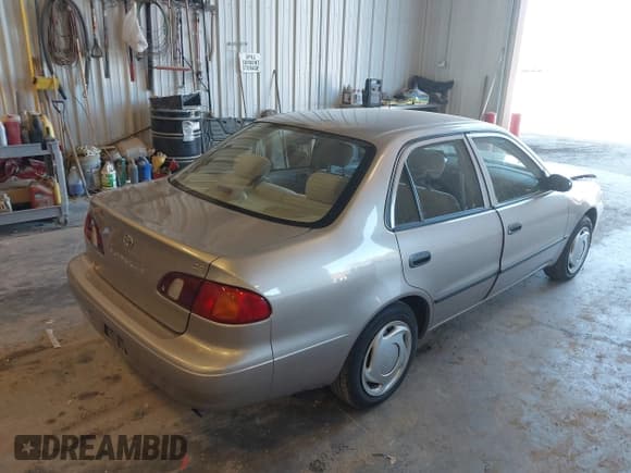 ✅ 1999 Toyota Corolla LE • VIN: 2T1BR12EXXC198079 • Лот: 43469173. Опубликован ранее на IAAI с пробегом 84 359 миль. Бесплатный доступ к архиву аукционных продаж из США и подробный отчёт об истории автомобиля на DreamBid. Изображение 4.