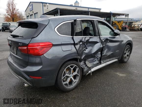 ✅ 2018 BMW X1 xDrive28i • VIN: WBXHT3C33J5K23187 • Lot: 71063192. Listed on Copart with 97,403 mi. Free auction sales archive from the USA and detailed vehicle history report at DreamBid. Image 3.