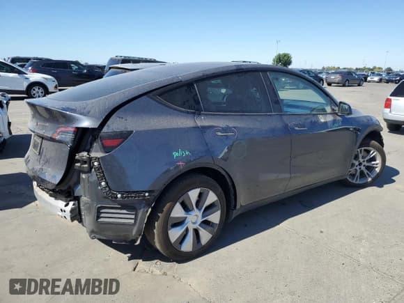 ✅ 2023 Tesla Model Y • VIN: 7SAYGDED4PF941029 • Лот: 82220065. Опубликован ранее на Copart с пробегом 34 789 миль. Бесплатный доступ к архиву аукционных продаж из США и подробный отчёт об истории автомобиля на DreamBid. Изображение 3.