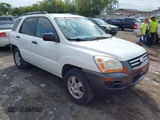 ✅ 2007 Kia Sportage LX • VIN: KNDJF724877372666 • Лот: 43223288. Опубликован ранее на IAAI с пробегом 253 597 миль. Бесплатный доступ к архиву аукционных продаж из США и подробный отчёт об истории автомобиля на DreamBid. Изображение 1.