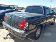 ✅ 2002 Lincoln Blackwood • VIN: 5LTEW05A22KJ02863 • Lot: 41886381. Listed on IAAI with 180,527 mi. Free auction sales archive from the USA and detailed vehicle history report at DreamBid. Image 4.