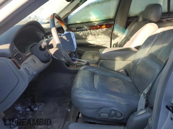 ✅ 2002 Cadillac Seville Touring STS • VIN: 1G6KY54962U298396 • Lot: 85769174. Wystawiony na Copart z przebiegiem 181 416 mil. Bezpłatny archiwum sprzedaży aukcyjnych z USA i szczegółowy raport historii pojazdu na DreamBid. Zdjęcie 7.