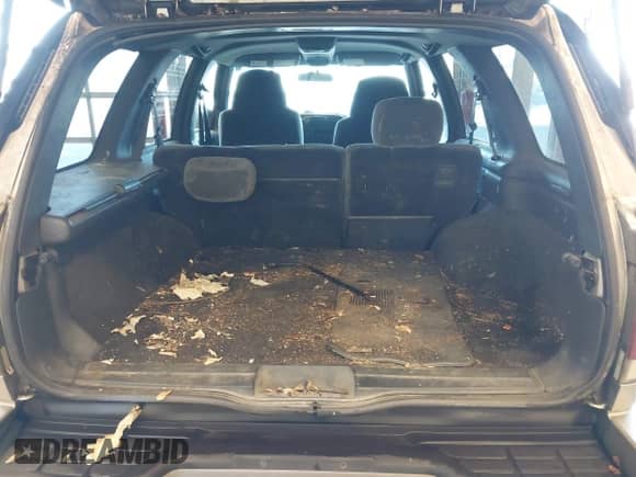 2001 Chevrolet Blazer LT z VIN 1GNDT13WX12201416, wystawiony jako IAAI lot #41307116 z przebiegiem 244 058 mil mil oraz . Historia ofert i sprzedaży dostępna na DreamBid. Obrazek 13.