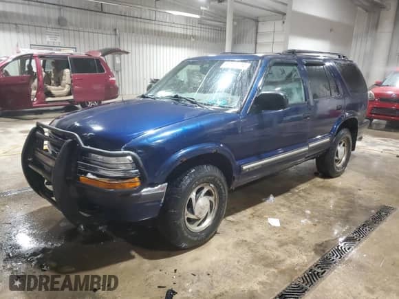 2001 Chevrolet Blazer LT with VIN 1GNDT13W912134288, listed as a Copart auction lot 87112824 with 152,925 mi miles and Salvage title. Bid and sale history available at DreamBid. Image 1.