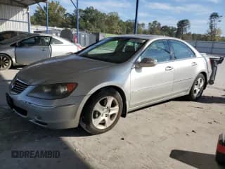 ✅ 2005 Acura RL • VIN: JH4KB16515C002484 • Lot: 87262405. Listed on Copart with 144,909 mi. Free auction sales archive from the USA and detailed vehicle history report at DreamBid. Image 1.