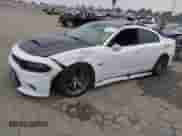 2016 Dodge Charger SRT 392 with VIN 2C3CDXEJ1GH347827, listed as a IAAI auction lot 43011873 with 128,926 mi miles and . Bid and sale history available at DreamBid. Image 2.