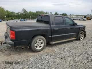 2009 Dodge Dakota Bighorn/Lonestar с VIN 1D7HE38P79S790167, выставлен на аукционе Copart как лот 51353734 с пробегом 262 039 миль миль и Списание • Salvage title. История ставок и продаж доступна на DreamBid. Изображение 3.