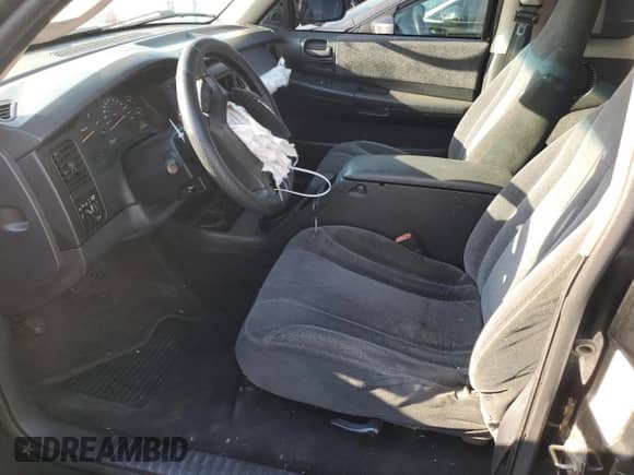 2001 Dodge Dakota Sport z VIN 1B7GL22Z01S315190, wystawiony jako Copart lot #60171404 z przebiegiem 145 397 mil mil oraz Nie do naprawy • Non repairable. Historia ofert i sprzedaży dostępna na DreamBid. Obrazek 7.