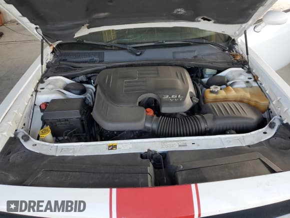 ✅ 2013 Dodge Challenger SXT • VIN: 2C3CDYAG6DH661131 • Lot: 85192664. Wystawiony na Copart z przebiegiem 147 525 mil. Bezpłatny archiwum sprzedaży aukcyjnych z USA i szczegółowy raport historii pojazdu na DreamBid. Zdjęcie 11.