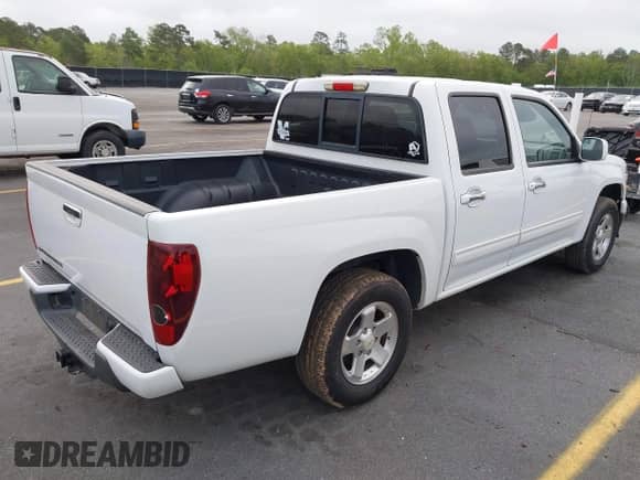 2012 Chevrolet Colorado 1LT z VIN 1GCDSCFE0C8101609, wystawiony jako IAAI lot #41914027 z przebiegiem 143 805 mil mil oraz . Historia ofert i sprzedaży dostępna na DreamBid. Obrazek 4.