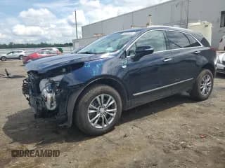 ✅ 2022 Cadillac XT5 AWD Premium Luxury • VIN: 1GYKNDR42NZ111086 • Lot: 65403035. Wystawiony na Copart z przebiegiem 38 915 mil. Bezpłatny archiwum sprzedaży aukcyjnych z USA i szczegółowy raport historii pojazdu na DreamBid. Zdjęcie 1.