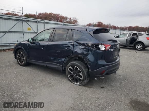 ✅ 2016 Mazda CX-5 Grand Touring • VIN: JM3KE4DY7G0859184 • Lot: 92858065. Wystawiony na Copart z przebiegiem 45 518 mil. Bezpłatny archiwum sprzedaży aukcyjnych z USA i szczegółowy raport historii pojazdu na DreamBid. Zdjęcie 2.