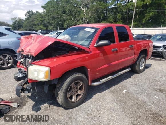 ✅ 2005 Dodge Dakota SLT • VIN: 1D7HE48N15S189173 • Lot: 67297035. Listed on Copart with 211,526 mi. Free auction sales archive from the USA and detailed vehicle history report at DreamBid. Image 1.