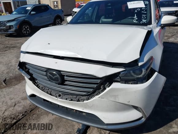 ✅ 2020 Mazda CX-9 Grand Touring • VIN: JM3TCADY5L0413201 • Lot: 41462802. Wystawiony na IAAI z przebiegiem 164 625 mil. Bezpłatny archiwum sprzedaży aukcyjnych z USA i szczegółowy raport historii pojazdu na DreamBid. Zdjęcie 6.