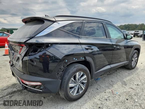 2023 Hyundai Tucson Blue z VIN KM8JBCA18PU084879, wystawiony jako Copart lot #71151435 z przebiegiem 13 377 mil mil oraz Szkoda całkowita • Salvage title. Historia ofert i sprzedaży dostępna na DreamBid. Obrazek 3.