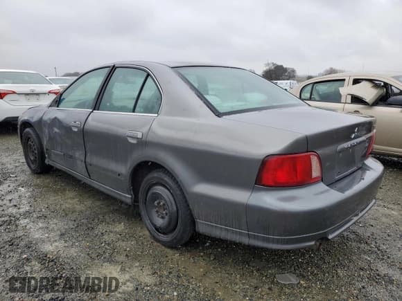 ✅ 2003 Mitsubishi Galant ES • VIN: 4A3AA46G03E180873 • Лот: 46141195. Опубликован ранее на Copart с пробегом 234 709 миль. Бесплатный доступ к архиву аукционных продаж из США и подробный отчёт об истории автомобиля на DreamBid. Изображение 2.