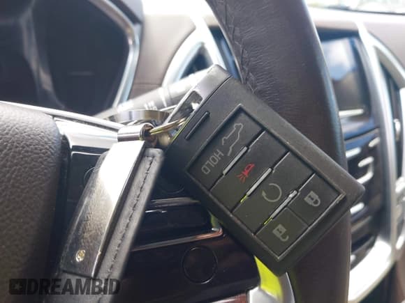 ✅ 2014 Cadillac SRX Performance Collection • VIN: 3GYFNCE35ES561742 • Lot: 42579887. Listed on IAAI with 95,009 mi. Free auction sales archive from the USA and detailed vehicle history report at DreamBid. Image 11.