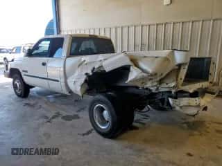 2002 Dodge 3500 with VIN 3B7MC33C42M227031, listed as a Copart auction lot 63870465 with 377,279 mi miles and Salvage title. Bid and sale history available at DreamBid. Image 2.