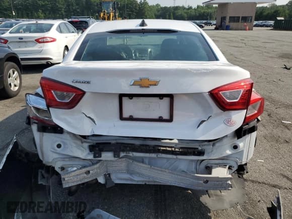 ✅ 2017 Chevrolet Cruze LS • VIN: 1G1BC5SM4H7276741 • Lot: 57883543. Listed on Copart with 94,899 mi. Free auction sales archive from the USA and detailed vehicle history report at DreamBid. Image 6.