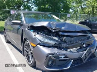 ✅ 2020 Honda Civic Si • VIN: 2HGFC1E58LH704766 • Lot: 42557202. Wystawiony na IAAI z przebiegiem 144 847 mil. Bezpłatny archiwum sprzedaży aukcyjnych z USA i szczegółowy raport historii pojazdu na DreamBid. Zdjęcie 1.