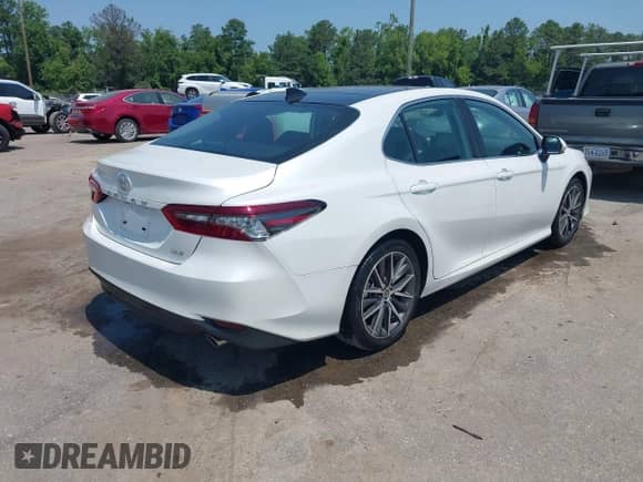 2022 Toyota Camry XLE with VIN 4T1F11AK2NU710770, listed as a IAAI auction lot 42604063 with 5,840 mi miles and . Bid and sale history available at DreamBid. Image 4.