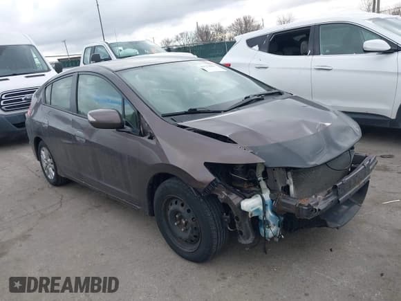 ✅ 2013 Honda Insight EX • VIN: JHMZE2H73DS006700 • Lot: 43779001. Listed on IAAI with 154,151 mi. Free auction sales archive from the USA and detailed vehicle history report at DreamBid. Image 1.