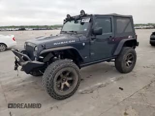 ✅ 2016 Jeep Wrangler Rubicon • VIN: 1C4BJWCGXGL236519 • Lot: 50650165. Listed on Copart with 51,689 mi. Free auction sales archive from the USA and detailed vehicle history report at DreamBid. Image 1.