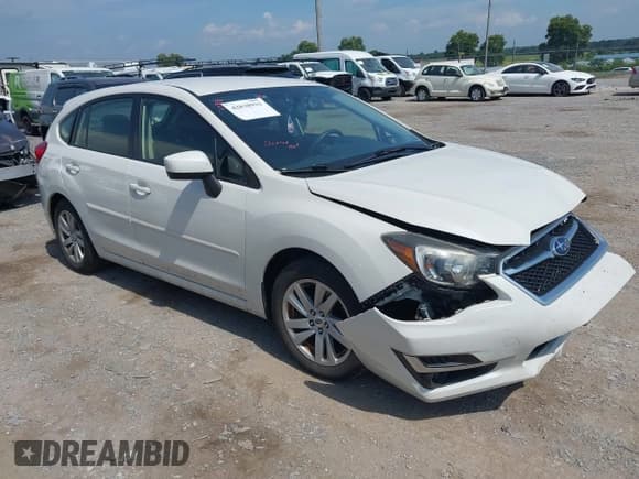 ✅ 2016 Subaru Impreza Premium • VIN: JF1GPAB67G8328602 • Lot: 42838931. Listed on IAAI with 71,648 mi. Free auction sales archive from the USA and detailed vehicle history report at DreamBid. Image 1.