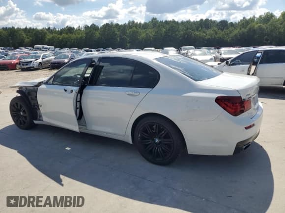 ✅ 2015 BMW 7 Series 750i xDrive • VIN: WBAYB6C51FD965925 • Lot: 64252505. Listed on Copart with 123,038 mi. Free auction sales archive from the USA and detailed vehicle history report at DreamBid. Image 2.