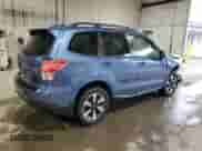 2017 Subaru Forester Limited with VIN JF2SJAJC5HH527843, listed as a Copart auction lot 82440135 with 64,197 mi miles and Salvage title. Bid and sale history available at DreamBid. Image 3.