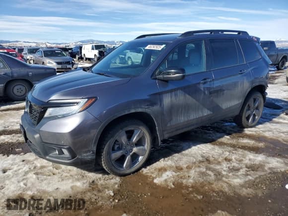 ✅ 2021 Honda Passport Touring • VIN: 5FNYF8H99MB006096 • Lot: 46292925. Listed on Copart with 40,809 mi. Free auction sales archive from the USA and detailed vehicle history report at DreamBid. Image 1.