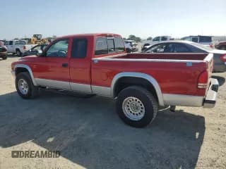 ✅ 2003 Dodge Dakota • VIN: 1D7GG42N43S185341 • Lot: 56236135. Wystawiony na Copart z przebiegiem 208 390 mil. Bezpłatny archiwum sprzedaży aukcyjnych z USA i szczegółowy raport historii pojazdu na DreamBid. Zdjęcie 2.