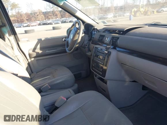 ✅ 2004 Mercury Monterey Convenience • VIN: 2MRDA20294BJ10526 • Lot: 41346103. Wystawiony na IAAI z przebiegiem 92 397 mil. Bezpłatny archiwum sprzedaży aukcyjnych z USA i szczegółowy raport historii pojazdu na DreamBid. Zdjęcie 5.