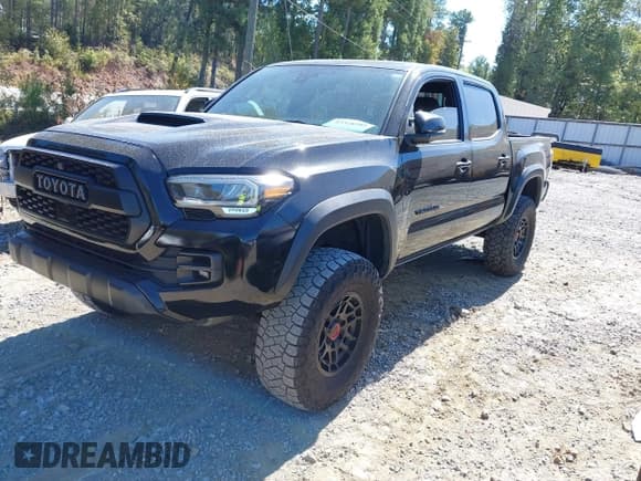 ✅ 2023 Toyota Tacoma Trail Edition • VIN: 3TYCZ5AN6PT112792 • Лот: 43328285. Опубликован ранее на IAAI с пробегом 48 916 миль. Бесплатный доступ к архиву аукционных продаж из США и подробный отчёт об истории автомобиля на DreamBid. Изображение 2.