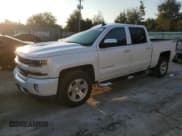 ✅ 2018 Chevrolet Silverado 1500 LT • VIN: 3GCUKREC4JG222167 • Лот: 72323374. Опубликован ранее на Copart с пробегом 70 876 миль. Бесплатный доступ к архиву аукционных продаж из США и подробный отчёт об истории автомобиля на DreamBid. Изображение 1.