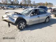 ✅ 2001 Pontiac Sunfire SE • VIN: 1G2JB524817417326 • Lot: 78038904. Wystawiony na Copart z przebiegiem 128 860 mil. Bezpłatny archiwum sprzedaży aukcyjnych z USA i szczegółowy raport historii pojazdu na DreamBid. Zdjęcie 1.