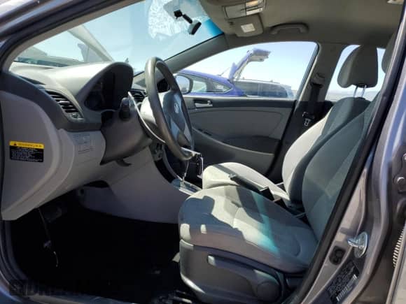 2005 Hyundai Accent GLS z VIN KMHCT4AEXFU929213, wystawiony jako Copart lot #60053935 z przebiegiem 152 892 mil mil oraz Szkoda całkowita • Salvage title. Historia ofert i sprzedaży dostępna na DreamBid. Obrazek 7.