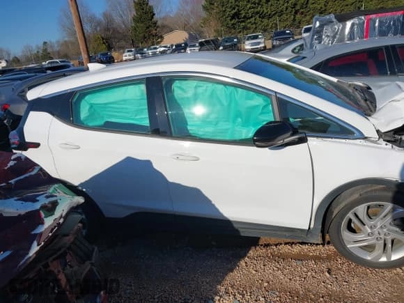 ✅ 2023 Chevrolet Bolt EV 1LT • VIN: 1G1FW6S04P4110635 • Lot: 41309864. Wystawiony na IAAI z przebiegiem 63 070 mil. Bezpłatny archiwum sprzedaży aukcyjnych z USA i szczegółowy raport historii pojazdu na DreamBid. Zdjęcie 13.