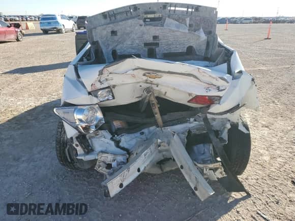 2014 Chevrolet Cruze 1LT z VIN 1G1PC5SB5E7435668, wystawiony jako Copart lot #86121945 z przebiegiem 82 481 mil mil oraz Szkoda całkowita • Salvage title. Historia ofert i sprzedaży dostępna na DreamBid. Obrazek 6.