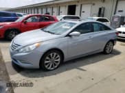 ✅ 2012 Hyundai Sonata SE • VIN: 5NPEC4AC9CH477031 • Lot: 60033034. Listed on Copart with 88,859 mi. Free auction sales archive from the USA and detailed vehicle history report at DreamBid. Image 1.
