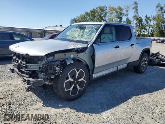 ✅ 2023 Rivian R1T Adventure • VIN: 7FCTGAAA7PN021358 • Лот: 67396445. Опубликован ранее на Copart с пробегом 11 939 миль. Бесплатный доступ к архиву аукционных продаж из США и подробный отчёт об истории автомобиля на DreamBid. Изображение 1.