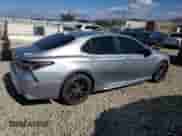 2021 Toyota Camry Hybrid SE с VIN 4T1G31AK5MU563311, выставлен на аукционе Copart как лот 84598085 с пробегом 85 740 миль миль и Списание • Salvage title. История ставок и продаж доступна на DreamBid. Изображение 3.