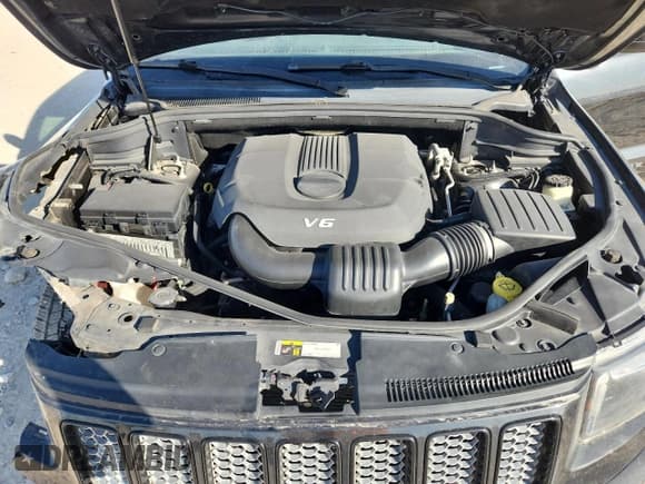 ✅ 2015 Jeep Grand Cherokee Altitude • VIN: 1C4RJEAG4FC654116 • Lot: 82632725. Listed on Copart with 166,784 mi. Free auction sales archive from the USA and detailed vehicle history report at DreamBid. Image 12.