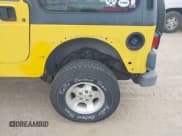 ✅ 2000 Jeep Wrangler Sport • VIN: 1J4FA49S2YP735627 • Lot: 43649472. Listed on IAAI with 140,099 mi. Free auction sales archive from the USA and detailed vehicle history report at DreamBid. Image 6.