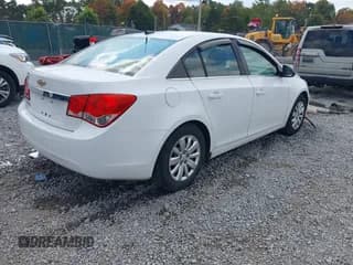 ✅ 2011 Chevrolet Cruze LS • VIN: 1G1PC5SH7B7158067 • Lot: 43251207. Listed on IAAI with 162,557 mi. Free auction sales archive from the USA and detailed vehicle history report at DreamBid. Image 4.